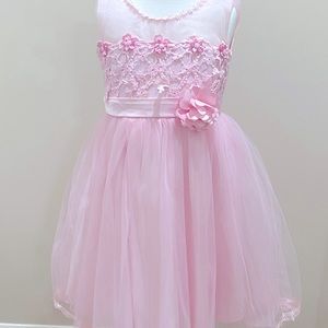 A pink flower dress, size is 12 in kids, very good condition.